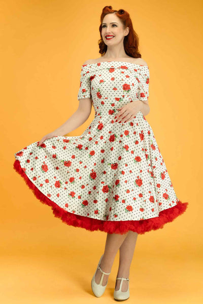 A lady wearing a Retro Heart & Rose Dress