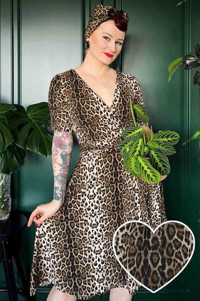 A lady wearing a Retro Leopard Print Casual Wrap Dress