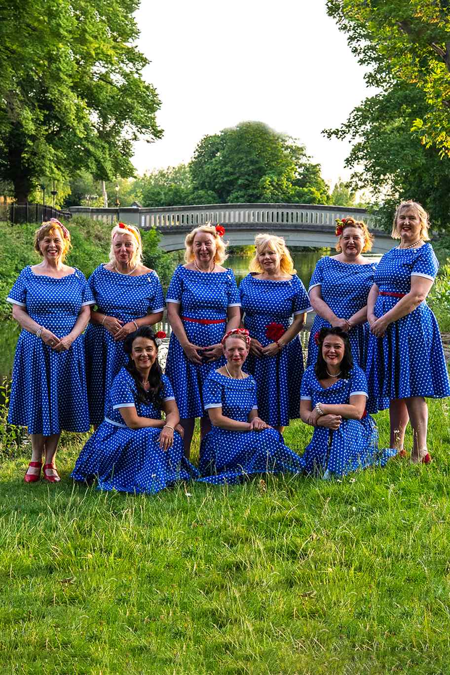 Models wearing Retro Polka Dot Swing Dress in Dark Blue