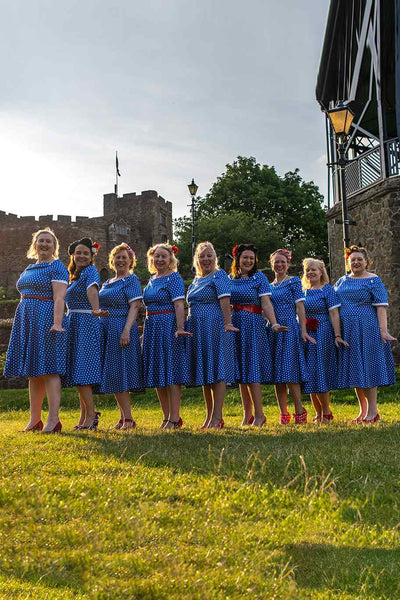 Models wearing Retro Polka Dot Swing Dress in Dark Blue