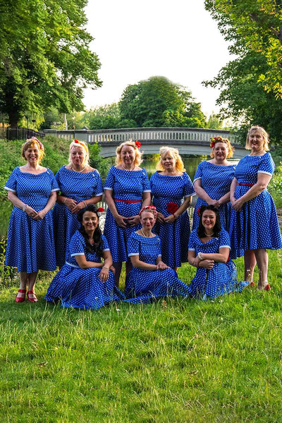 Models wearing Retro Polka Dot Swing Dress in Dark Blue