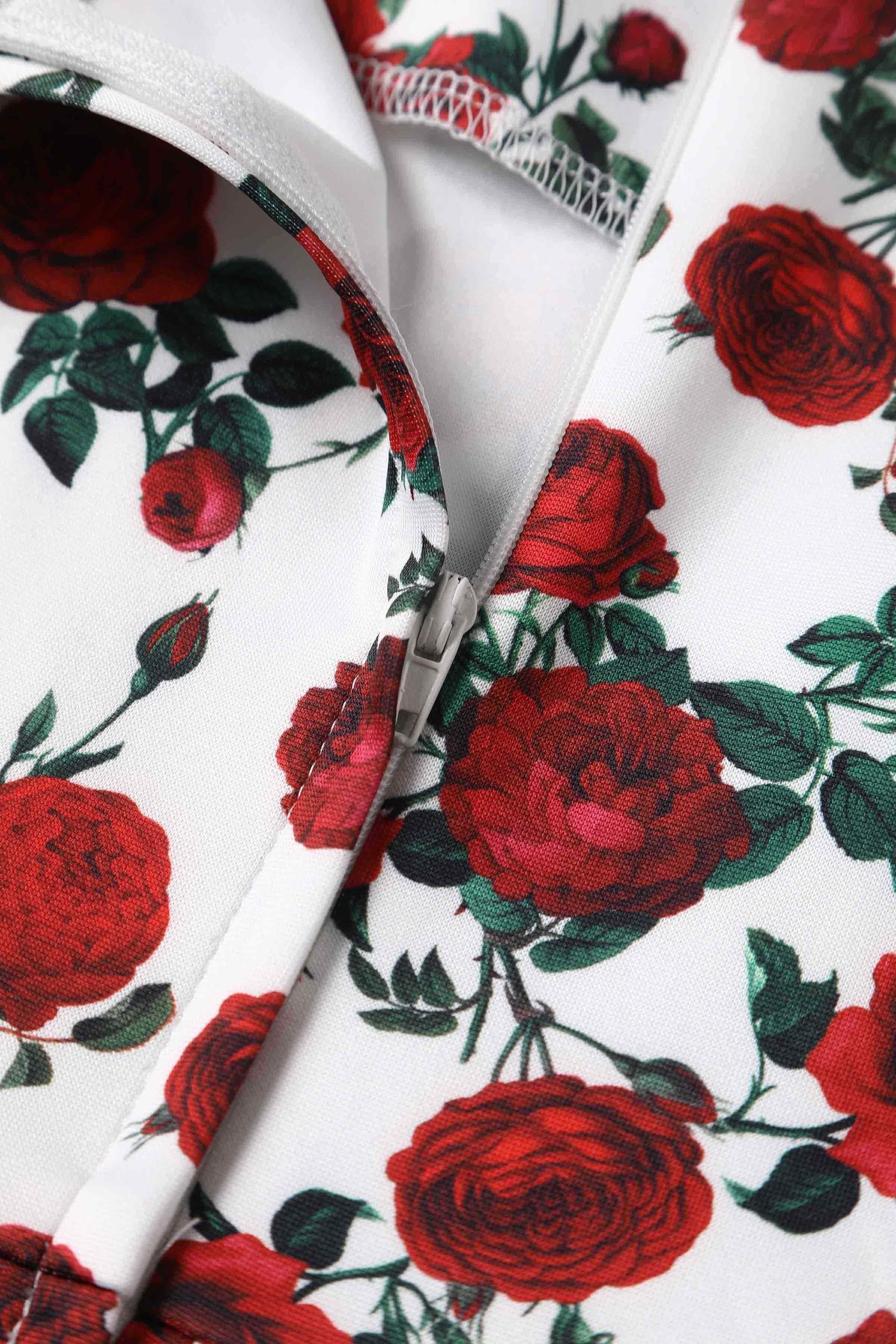 Close up view of Retro Red Rose Dress In White