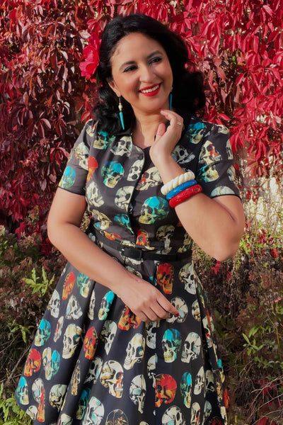 A model wearing a Rockabilly Black Skull Shirt Dress