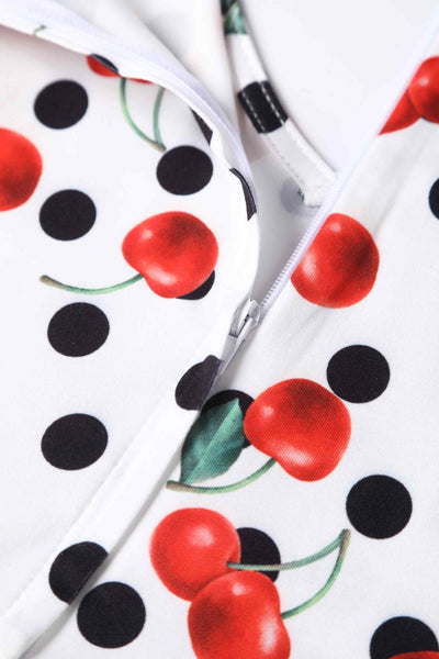 Close up view of Rockabilly Cherry Polka Dot Print Dress in White