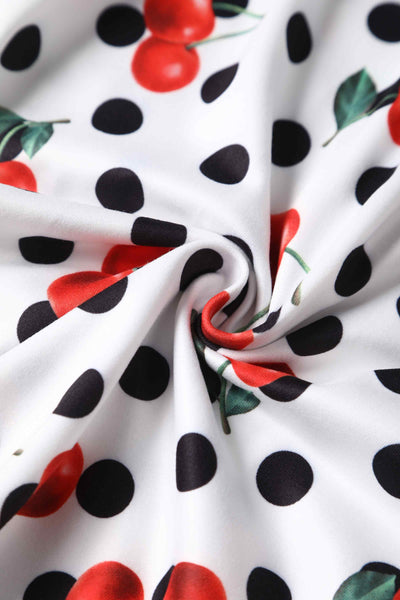 Close up view of Rockabilly Cherry Polka Dot Print Dress in White