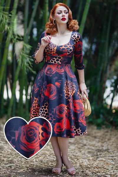 A model wearing a ockabilly Leopard Rose Midi Dress