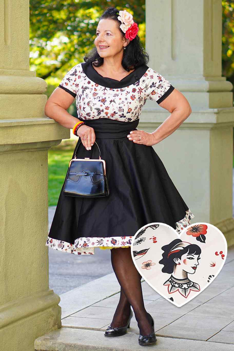 A lady wearing a Rockabilly Old School Tattoo Roll Collar Dress