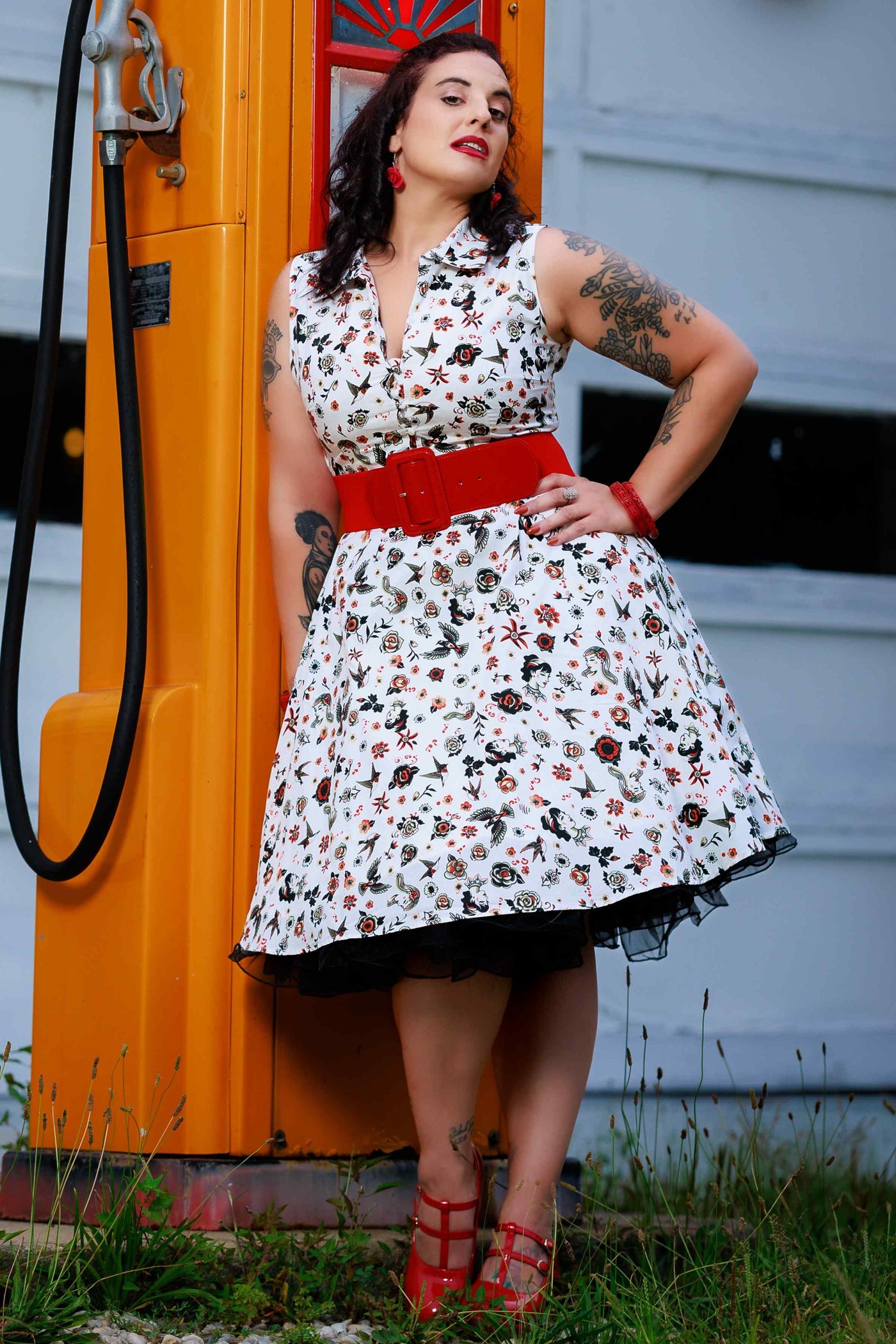 A model wearing a Poppy Rockabilly Old School Tattoo Shirt Dress