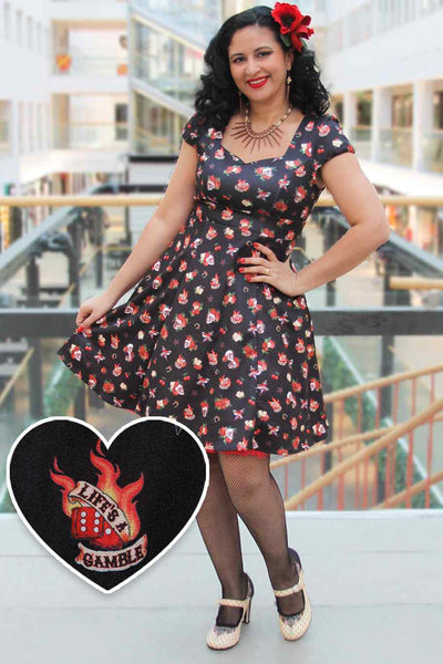 A model wearing Rockabilly Skull & Rose Dress