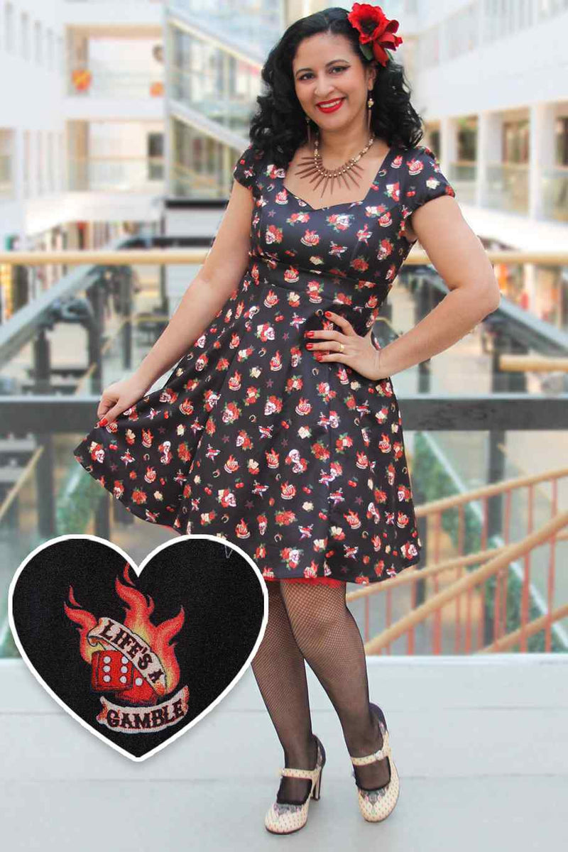 A model wearing Rockabilly Skull & Rose Dress