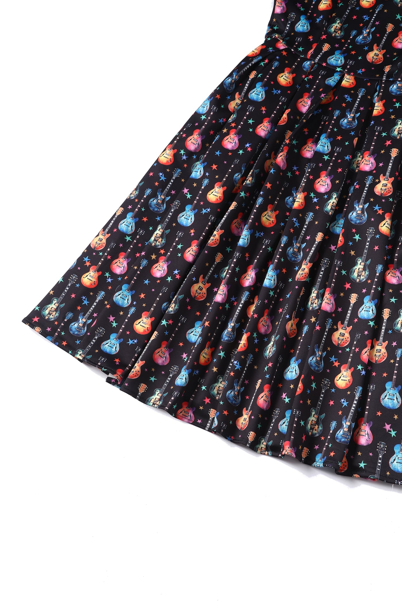 Close up view of Black Pleated Dress in Guitar & Stars Print