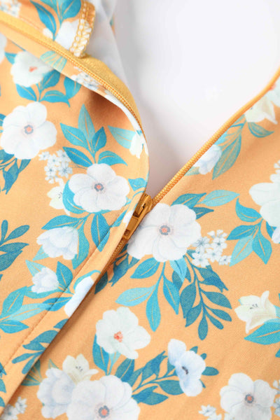 Close up  view of Rosaceae Floral Midi Dress In Yellow