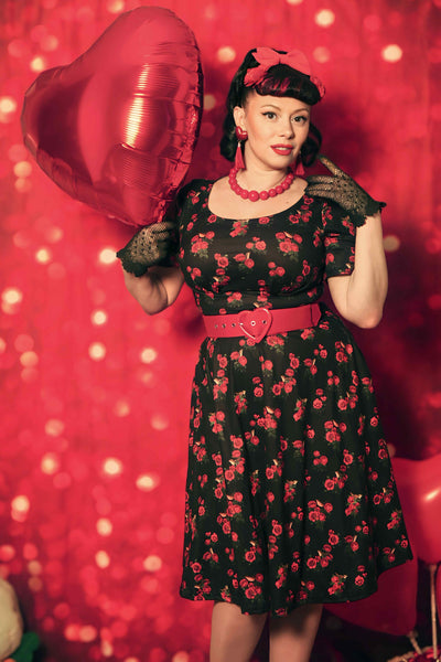 Customer wears our Brenda short sleeve dress in black red roses and birds print