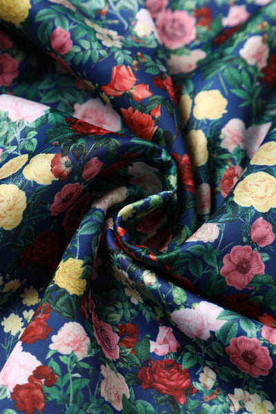 Close up view of Rose Print Pleated Bust Dress in Navy Blue