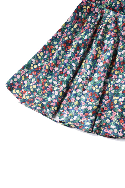 Close up view of Rose Print Pleated Bust Dress in Navy Blue