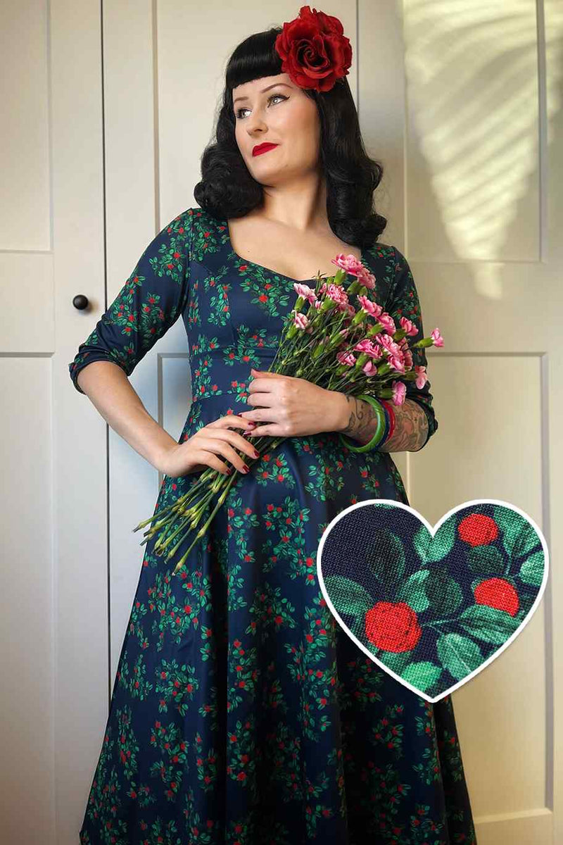 A model wearing a Rosebud Midi Dress On Navy Blue