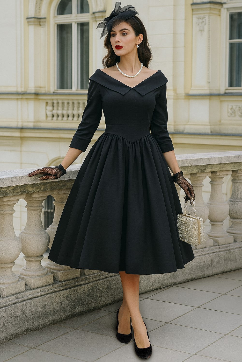 A model wearing a Ruth Black Retro Long Sleeved Dress