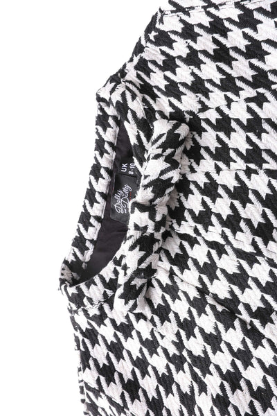 Close up view of Sabrina Monochrome Houndstooth Cape Jacket