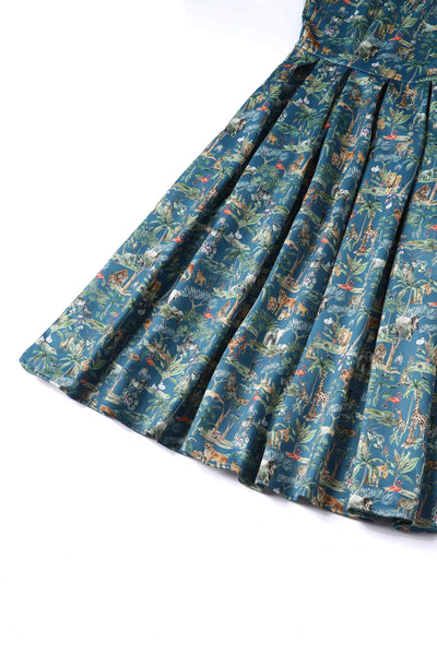 Close up view of Safari Animal Blue Box Pleated Dress