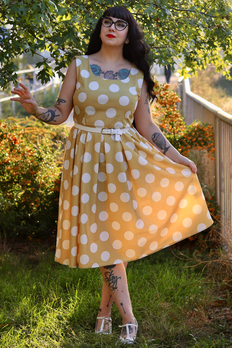 A model wearing a Sand Cream Polka Dot Dress