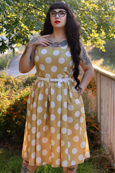 A model wearing a Sand Cream Polka Dot Dress