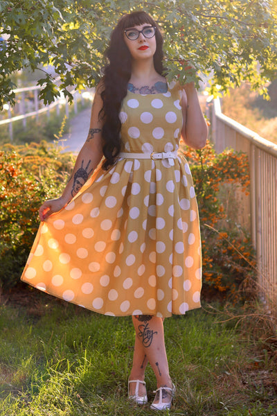 A model wearing a Sand Cream Polka Dot Dress