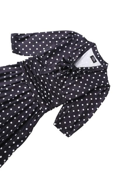 Close up view of Sandra Bow Tie Casual Dress In Black Polka Dots