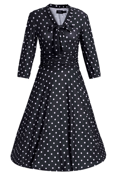 Front view of Sandra Bow Tie Casual Dress In Black Polka Dots