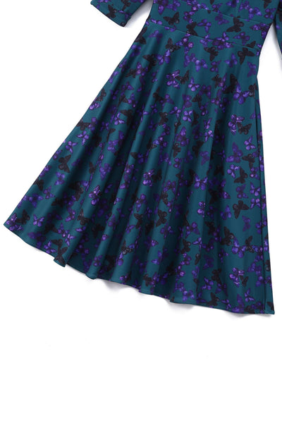 Close up view of Scarlette Butterfly Midi Dress In Peacock Blue