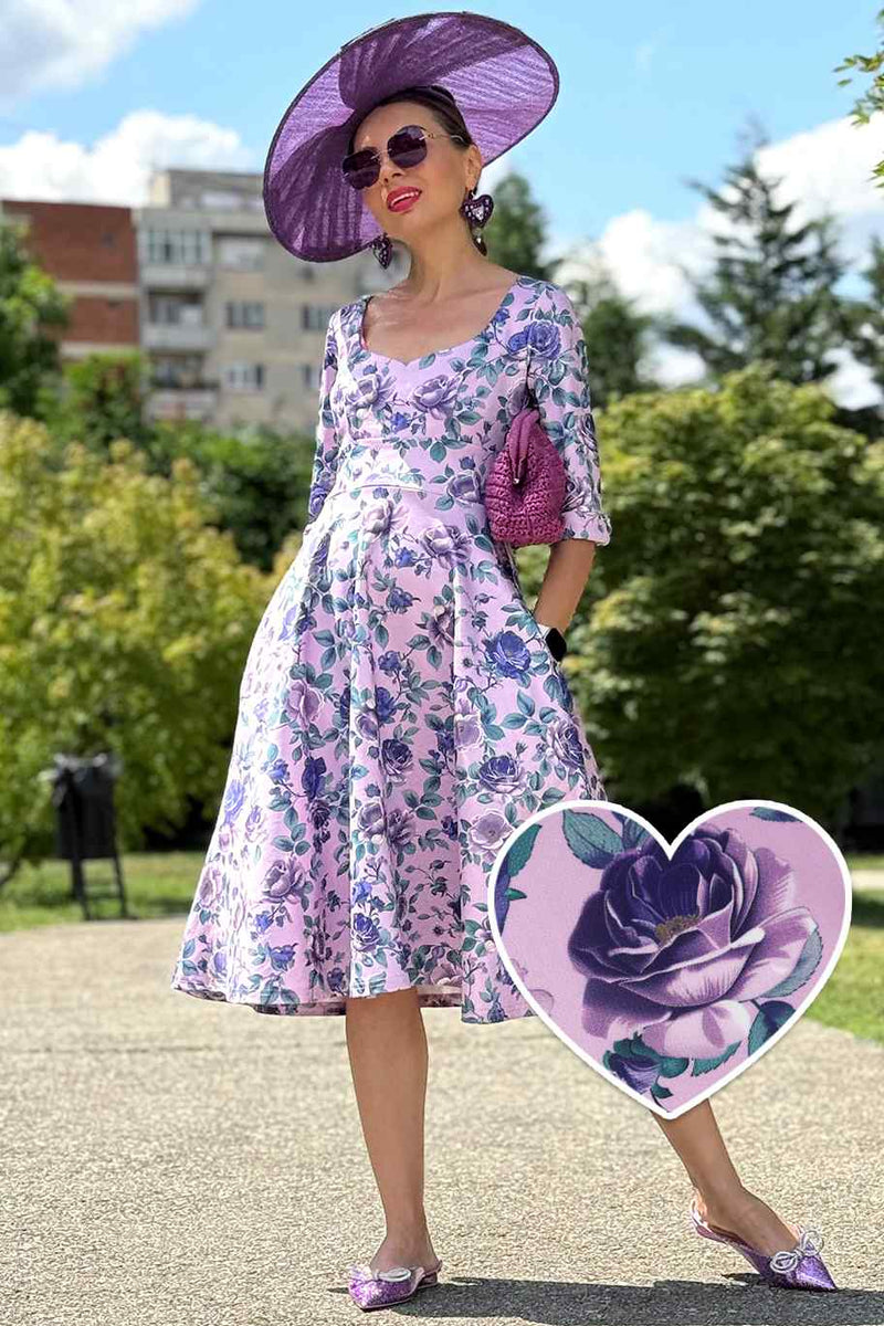 A model wearing a Scarlette Lilac Rose Midi Dress