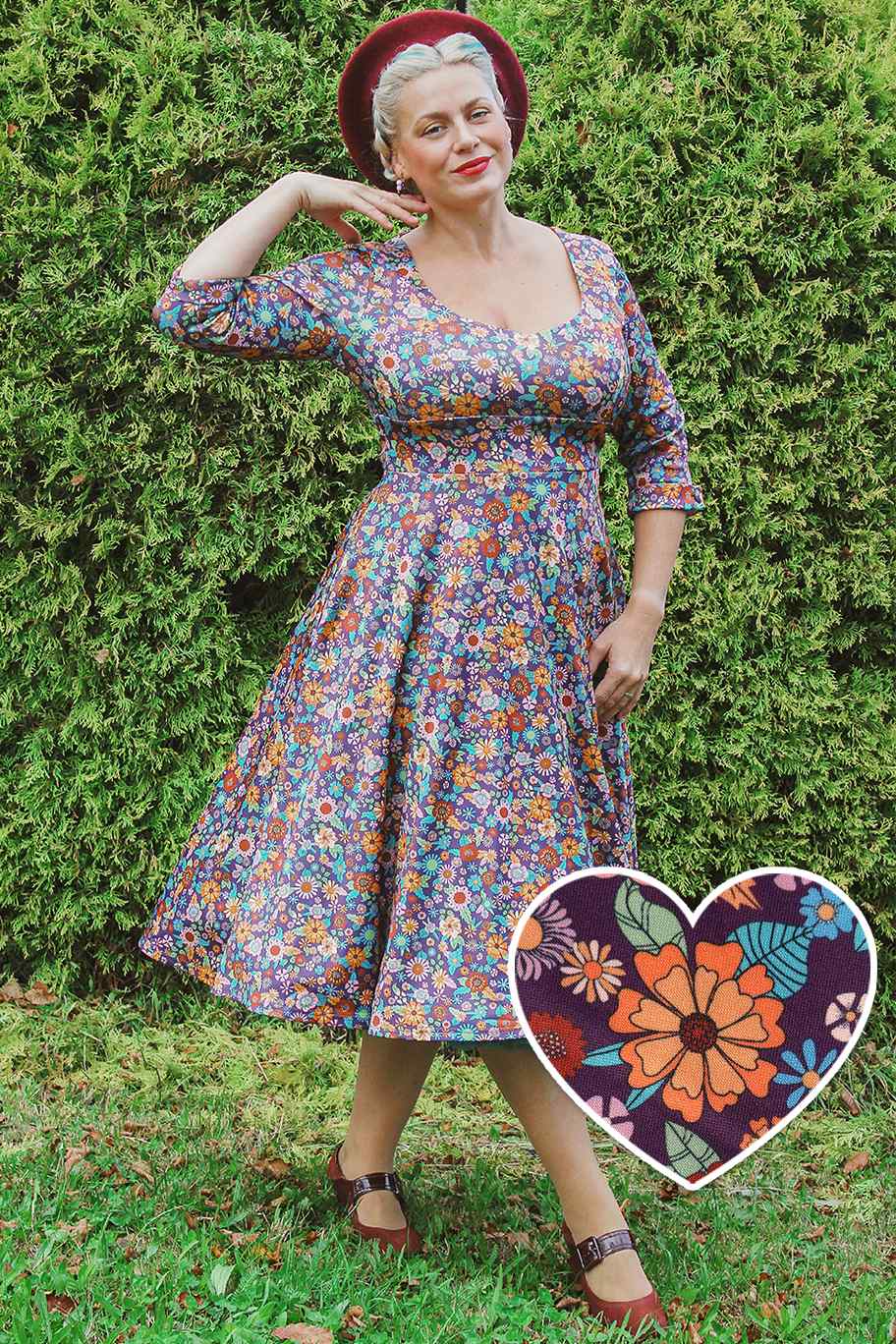 A model wearing a Retro 70s Floral Garden Dress