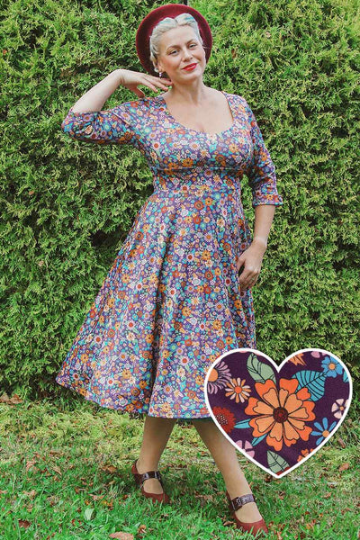 A model wearing a Retro 70s Floral Garden Dress