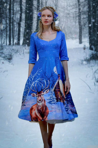 A model wearing a Scarlette Snowy Christmas Night Reindeer Midi Dress