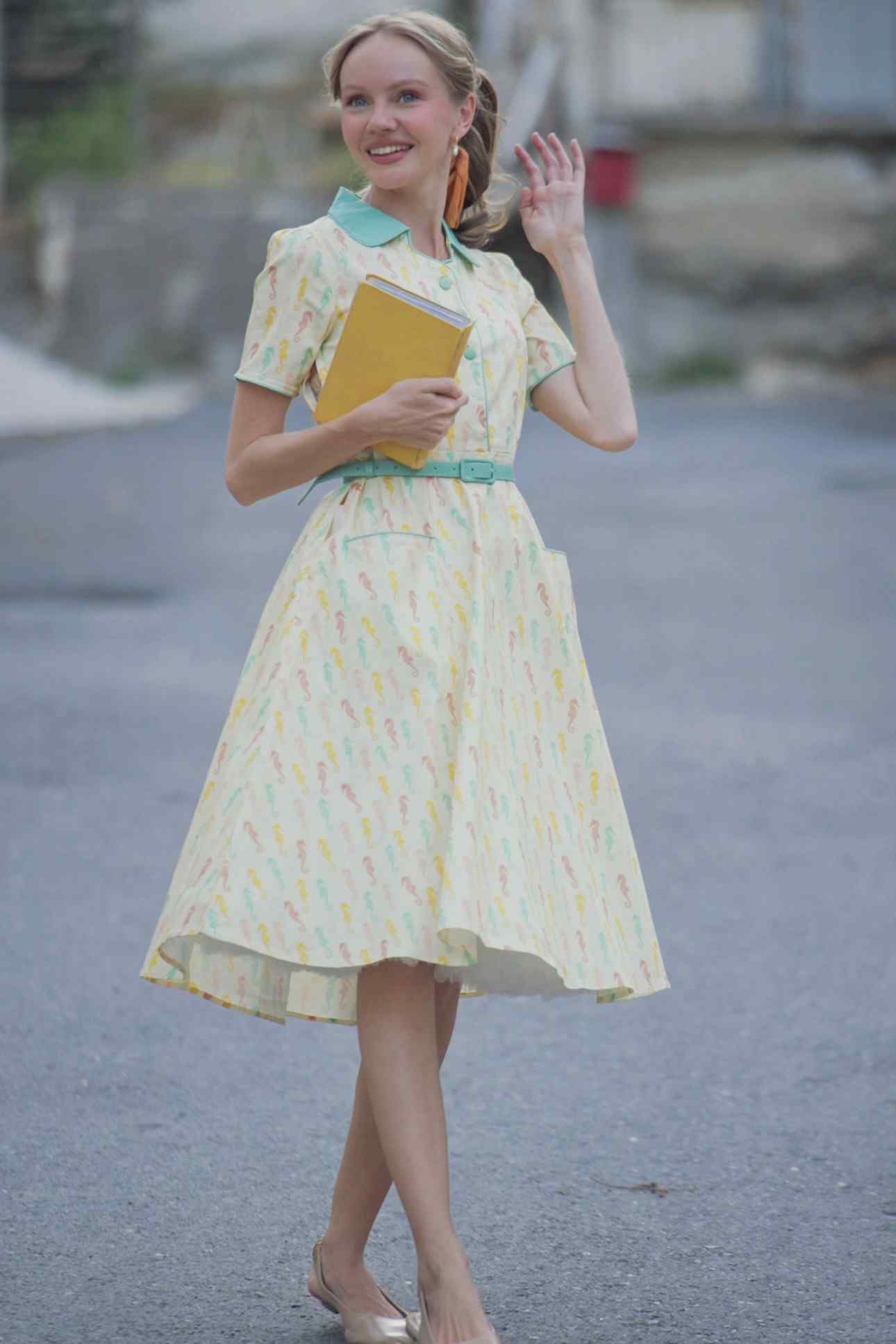 A model wearing Seahorse Midi Shirt Dress
