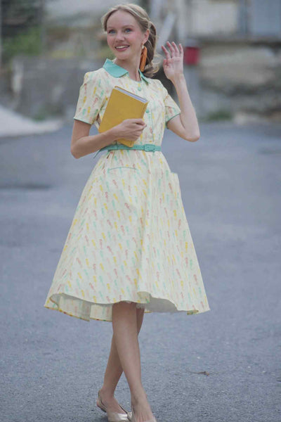 A model wearing Seahorse Midi Shirt Dress