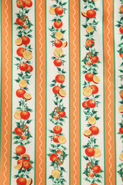Close up view of Sicilian Orange Midi Dress