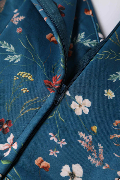Close up view of Teal Ditsy Floral Off Shoulder Dress