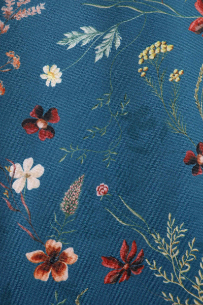 Close up view of Teal Ditsy Floral Off Shoulder Dress
