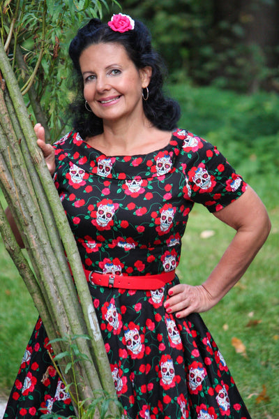 A lady wearing a Skulls & Roses Darlene Swing Dress