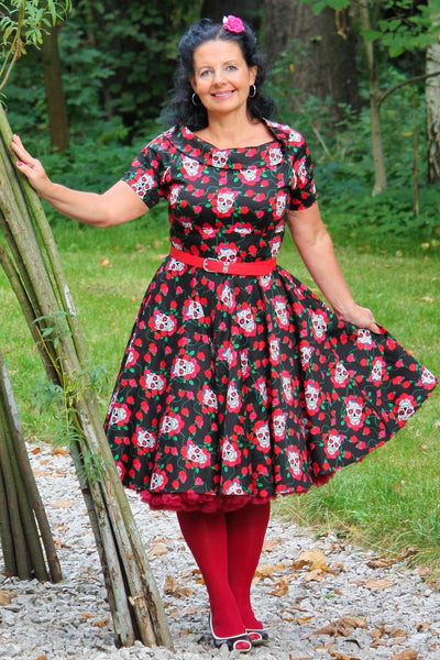 A lady wearing a Skulls & Roses Darlene Swing Dress