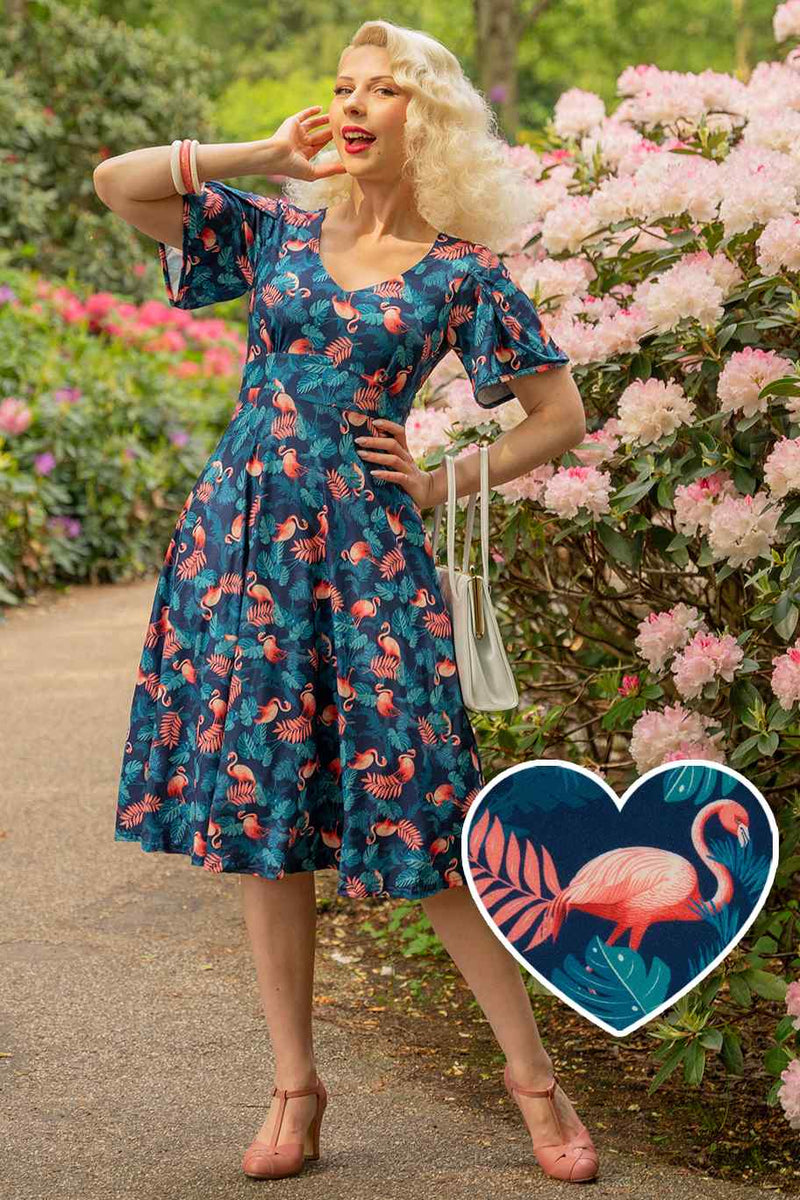 Janice Sleeved Tea Dress In Blue Flamingo & Leaves Print Janice Sleeved Tea Dress In Blue Flamingo & Leaves Print