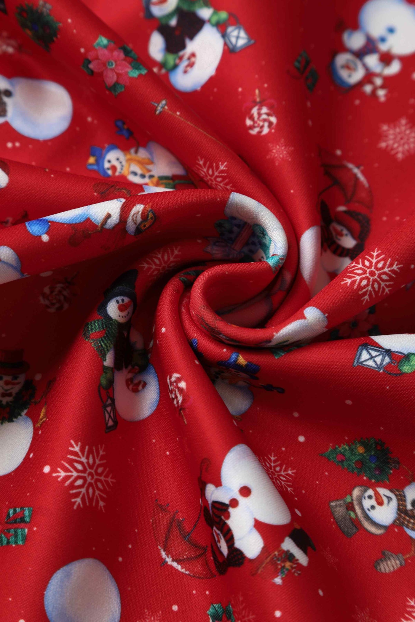 Close up view of Snowman print Midi Dress in red