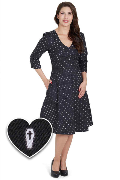 A model wearing Spooky Black Coffin Long Sleeved Dress