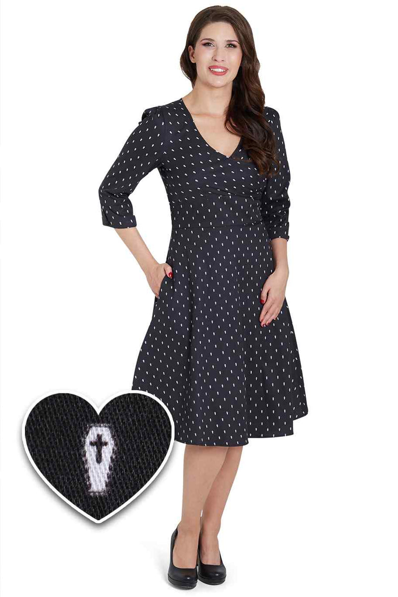 A model wearing Spooky Black Coffin Long Sleeved Dress