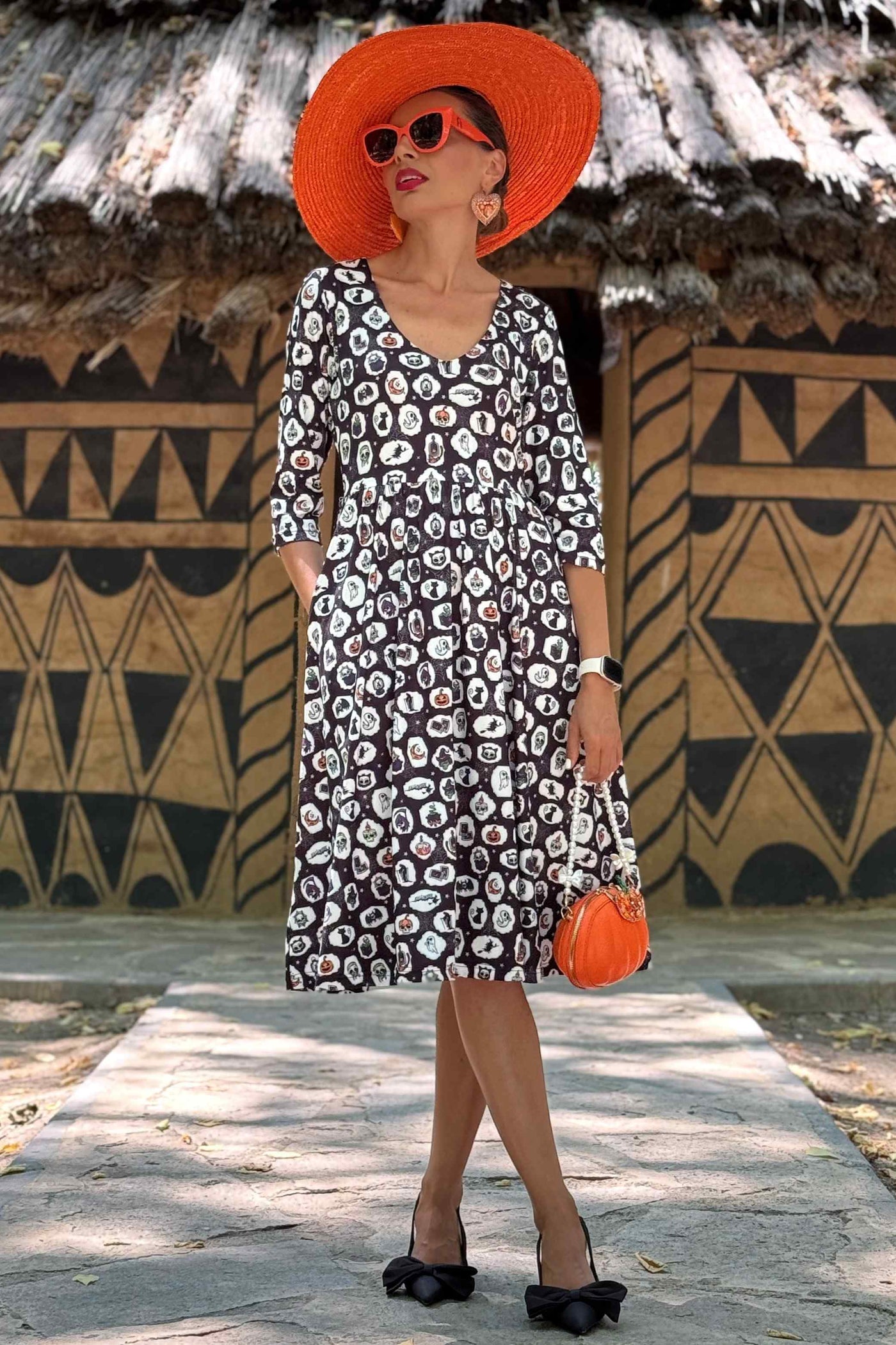 A model wearing a Billie Spooky Witchcraft Long Sleeved Dress