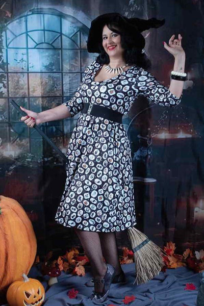 A model wearing Spooky Witchcraft Long Sleeved Dress