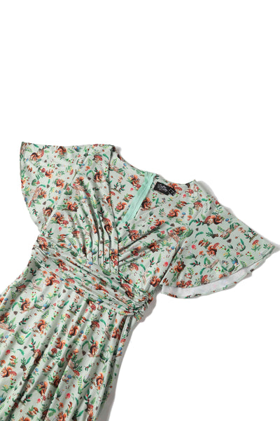 Close up view of Squirrel Woodland Print Tea Dress in Green