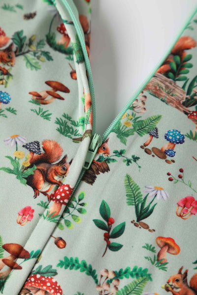 Close up view of Squirrel Woodland Print Tea Dress in Green