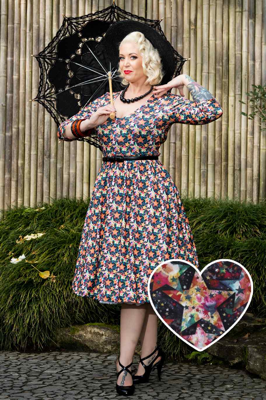 A model wearing a Starry Long Sleeved Dress