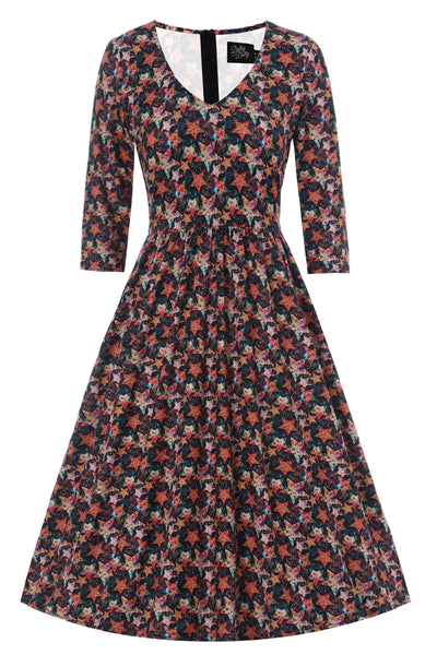 Front view of Stars Print Long Sleeved Dress in Black